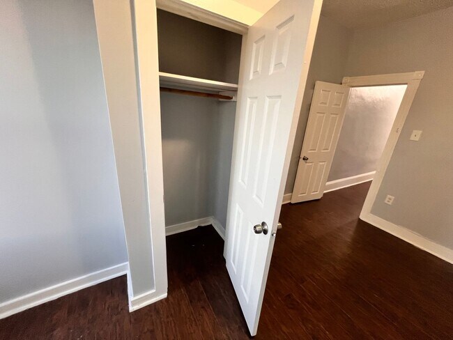 Building Photo - Updated 3 Bedroom 1.5 Bath Townhome w/ Paved Yard + Washer & Dryer