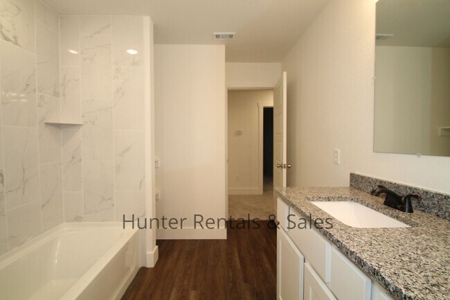 Building Photo - Upscale Four-Bedroom Townhome!