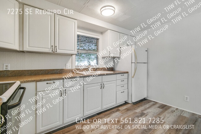 Building Photo - 7275 SE Redbird Cir