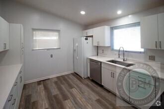 Building Photo - Spacious 4-Bedroom, 2-Bathroom Home for Re...