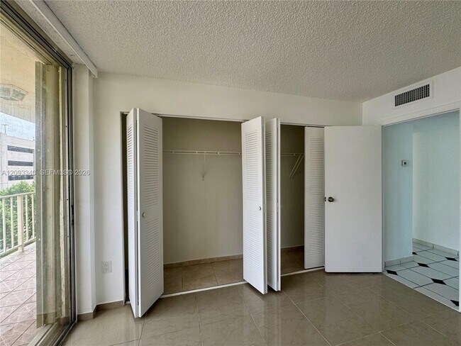 Building Photo - 4675 W 18th Ct