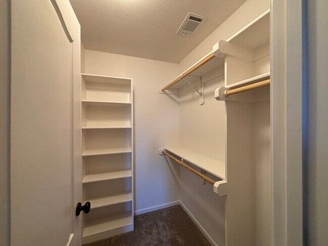 Building Photo - Modern Olathe Beauty with Covered Lanai, Loft & Main-Level Primary Suite