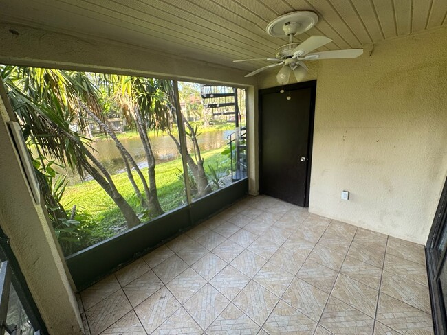 Building Photo - 3 BR / 2 BA Ground-Floor Condo | Screened ...