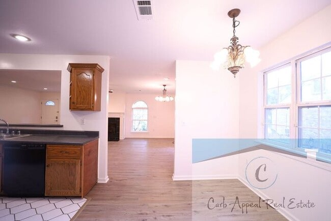 Building Photo - First month move in special $900!! Beautiful 3-bed, 2 bath condo with fireplace, 2-car garage - i...