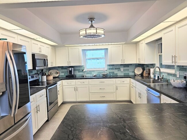 Building Photo - Waterfront 2 Bedroom, 2 Bath Stilt Home with Dock