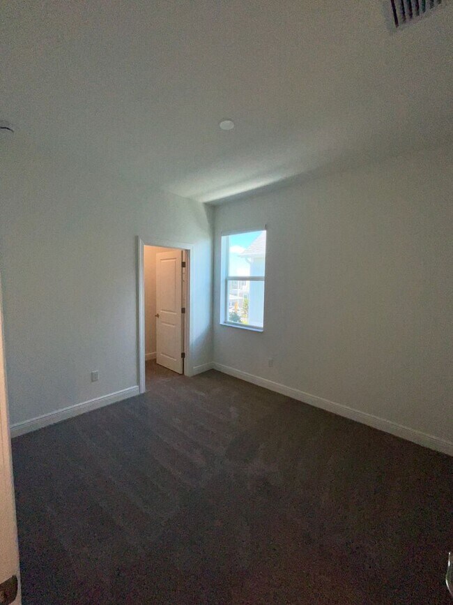 Building Photo - 3/2.5/2 Townhome in Rosette Park at Newfield