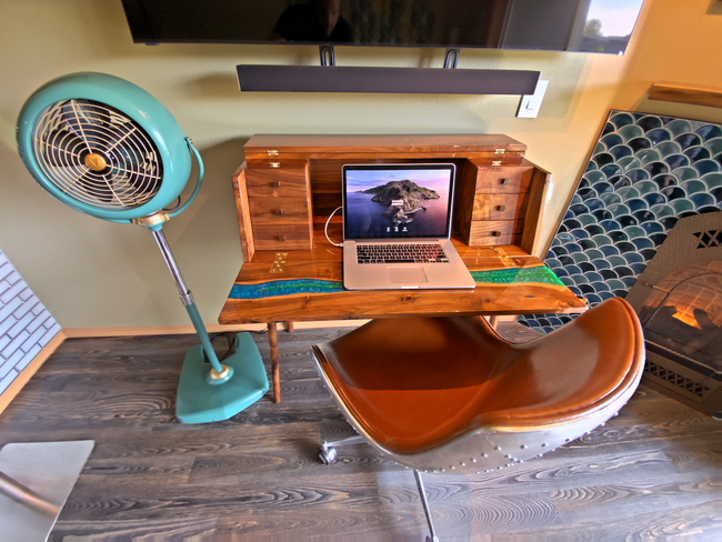 Desk and fan working area in living room - 3435 California Ave SW