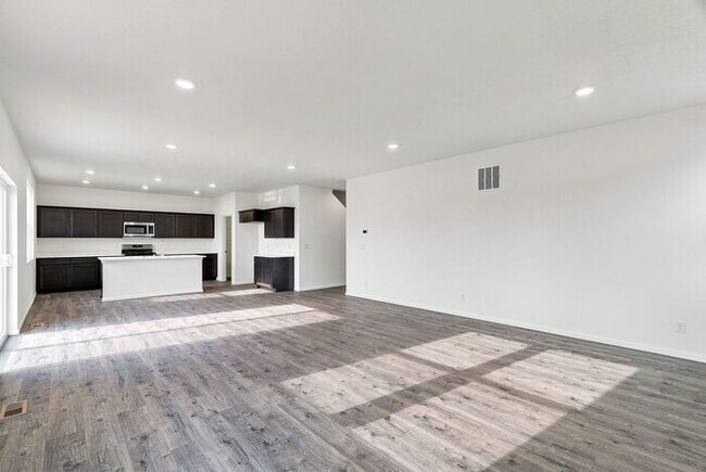 Building Photo - Spacious 5-Bedroom with Loft with 3-Car Garage