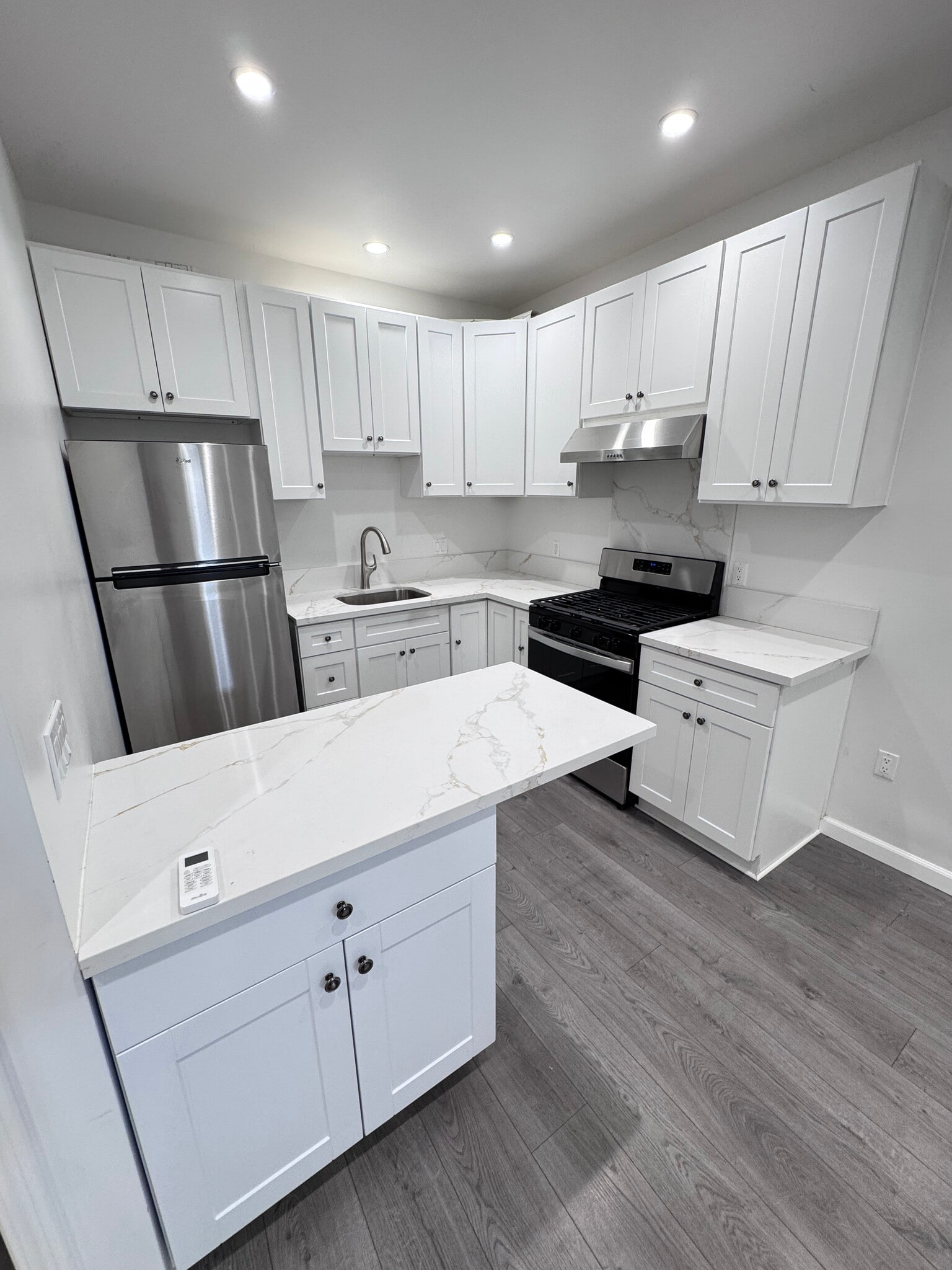 Kitchen with barstool - 13180 Branford St