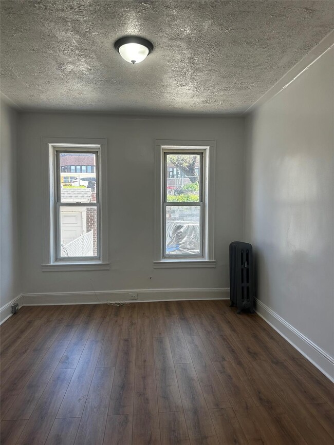 Building Photo - 26-33 96th St
