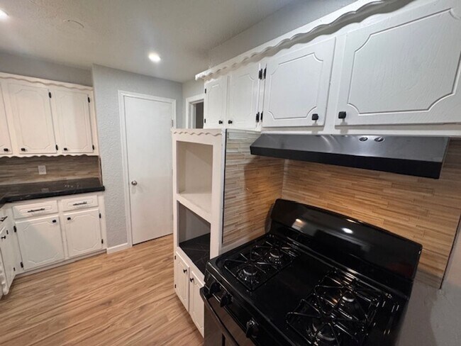 Building Photo - Newly remodeled 3 bed 1 bath garage conversion with monitored security!