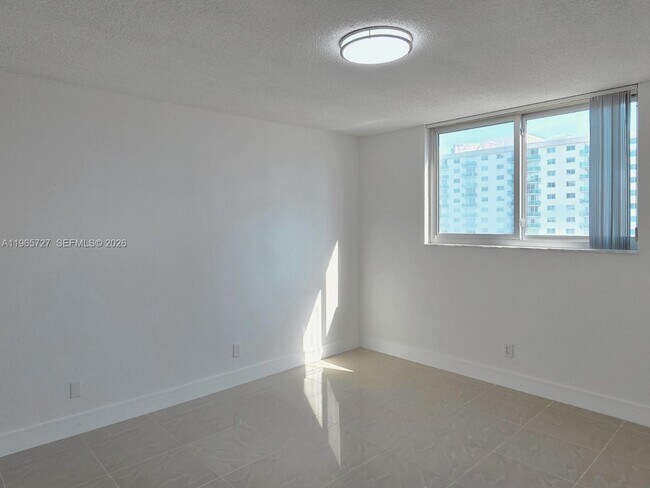 Building Photo - 19380 Collins Ave