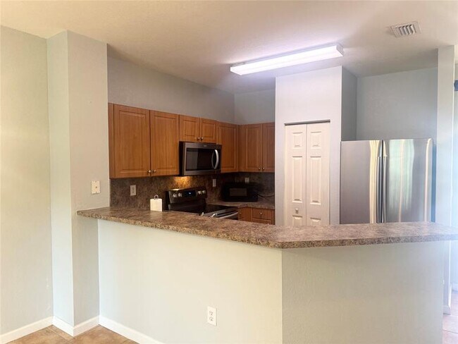 Building Photo - 5132 SE Mariner Garden Cir