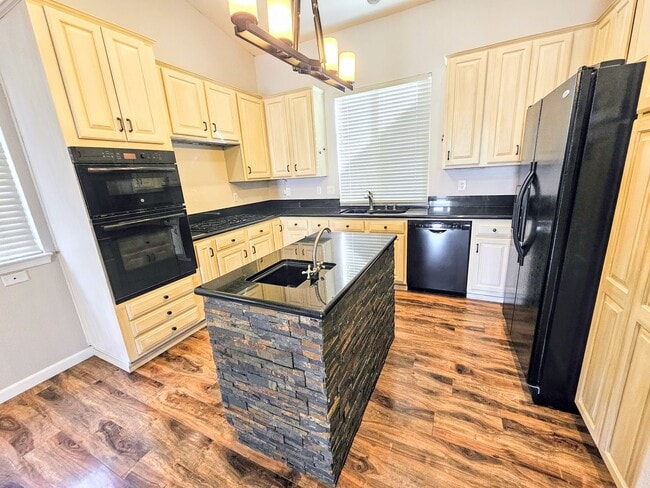 Building Photo - 3 car garage house w/RV parking near the Truckee River