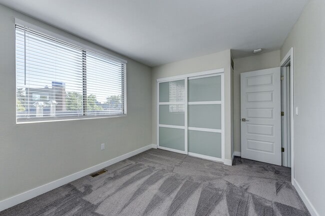 Building Photo - PRICE DROP! + MOVE IN SPECIAL!! 2 Bedroom Condo in Great Location with Pool and Underground Parking!