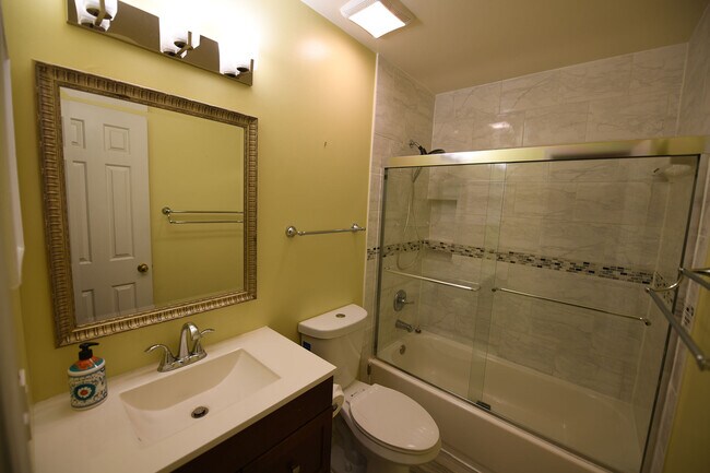 Building Photo - Gorgeous 4 BR 2+2 Baths Colonial - Finished Walk-Out Basement and Car Garage