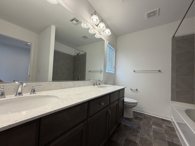 Building Photo - 7869 Tyrell Peaks St