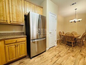 Building Photo - 10341 W Girton Dr