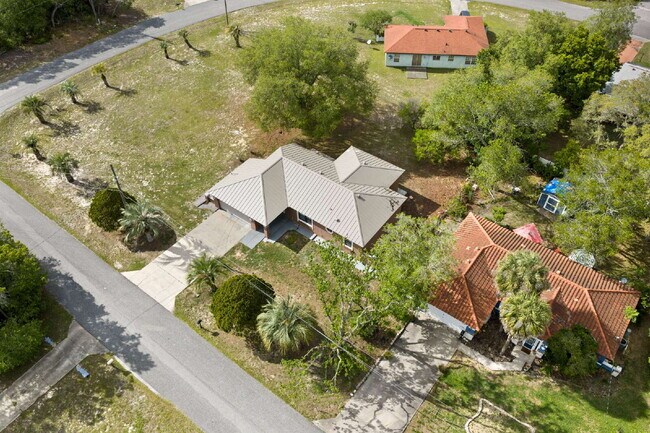 Building Photo - Comfort, Space & Convenience on a Peaceful Corner Lot in the Shores