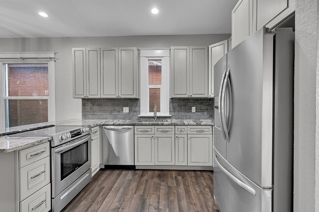 Building Photo - $3,040.95, $300 off the first month's rent, 4 Beds - 2 Bath, Single Family Home in Denver with Wa...