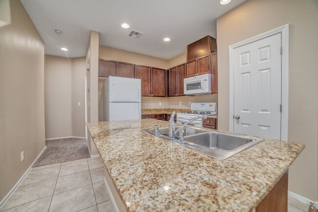Building Photo - 4-BEDROOM / 3-BATH 2-STORY LOVELY HOME WITHIN GATED COMMUNITY CLOSE TO NELLIS AIR FORCE BASE!