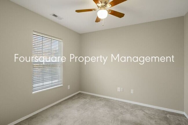 Building Photo - Charming Townhome with Open Layout, Back Patio & One-Car Garage – Near RTP, RDU & Everyday Conven...