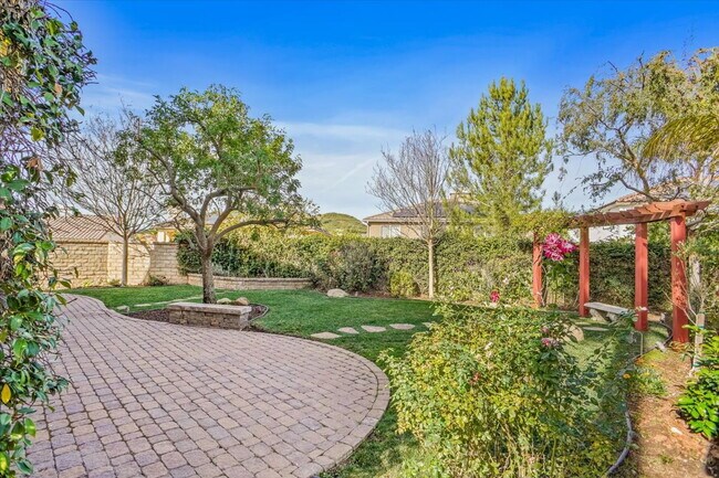 Building Photo - "Spacious 4-Bedroom Retreat with Cozy Fireplace on Starfall Way, Santa Clarita!"