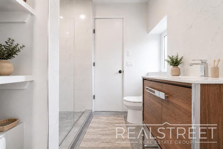 Building Photo - Sun-Filled Penthouse Duplex with Massive Private Terrace & Bonus Storage Room