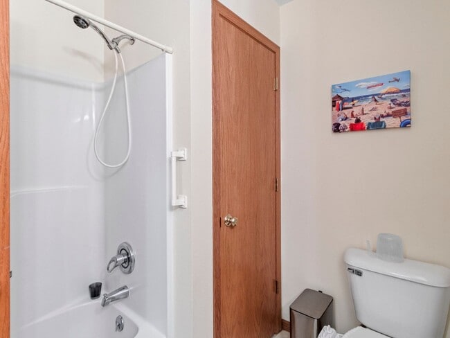 Building Photo - Spacious 3BR/3BA Condo with Finished Basement + 2-Car Garage — Available Now