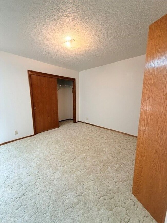 Building Photo - Charming 3-Bedroom Home with Garage & Lawn Care Included
