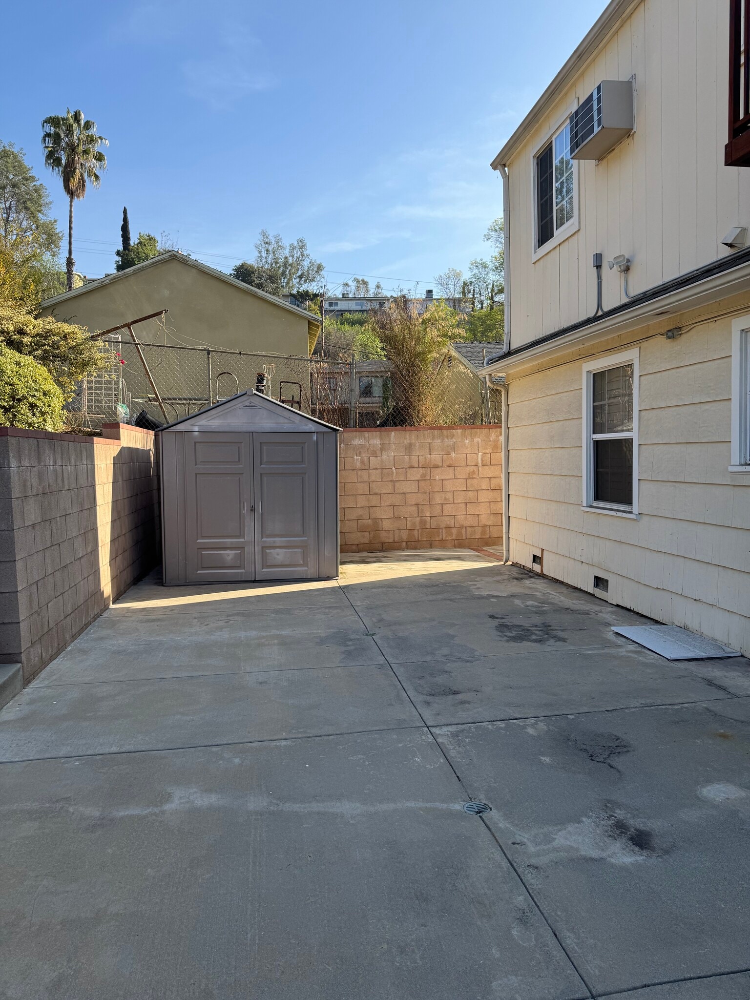 BACKYARD WITH STORAGE SHED - 6247 Oak Crest Way