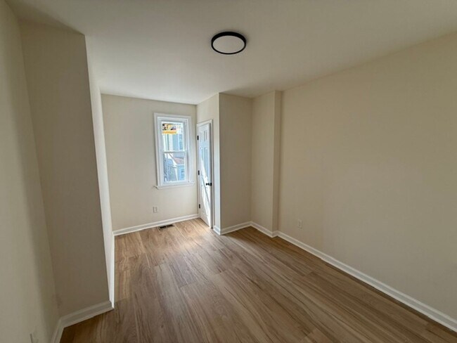 Building Photo - 3-Bedroom Port Richmond Home with Central Air and Expansive Backyard