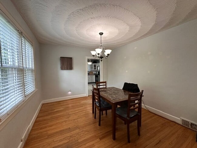 Building Photo - Charming Brick Cape Cope