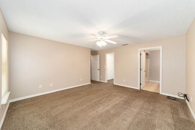 Building Photo - Peaceful 3-Bedroom Home with Open Floor Plan & Two-Car Garage in Rainbow Lakes Estates!