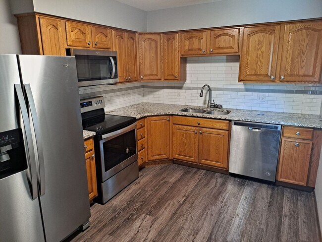 Building Photo - District 66 - 4/2/1 fenced backyard