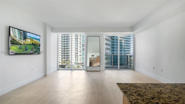 Building Photo - 10275 Collins Ave