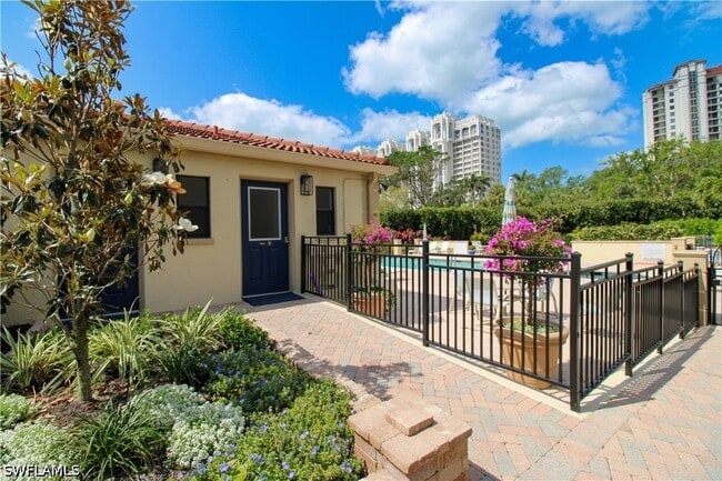 Building Photo - 7024 Pelican Bay Blvd