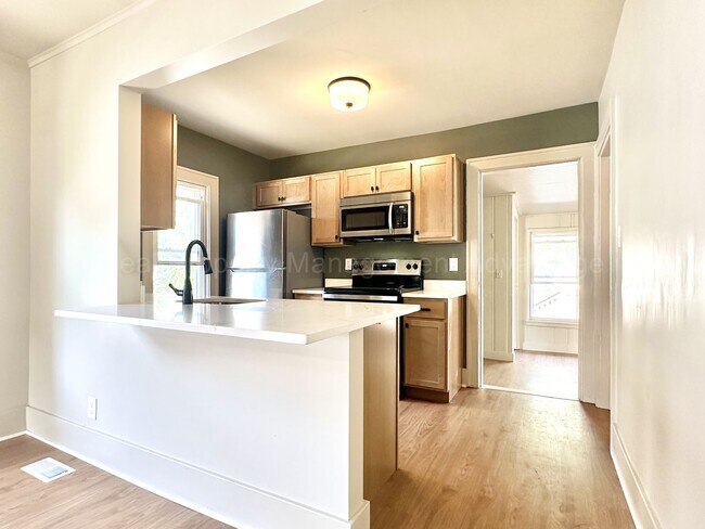 Building Photo - Fully Updated 2BR / 1.5BA – Steps from Dow...
