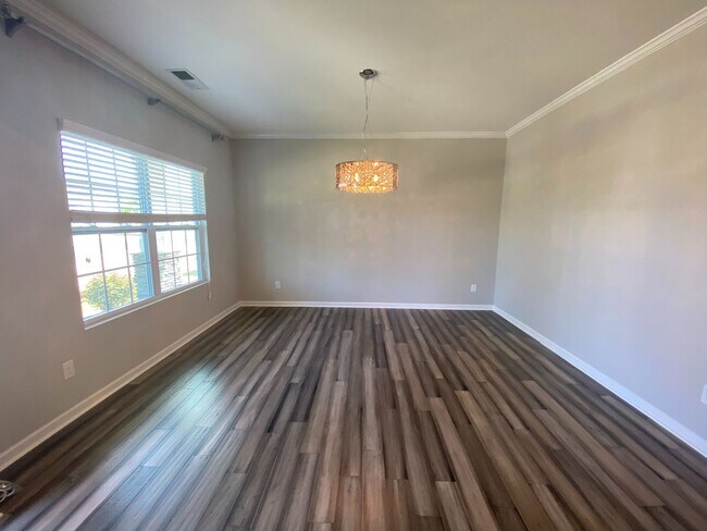 Building Photo - Move-in ready, 1.5 story home located in t...