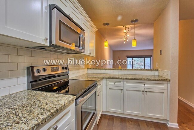 Building Photo - 2 Bed, 2 Bath Condo with Roof Top Patio, Covered Balcony and Secure Garage