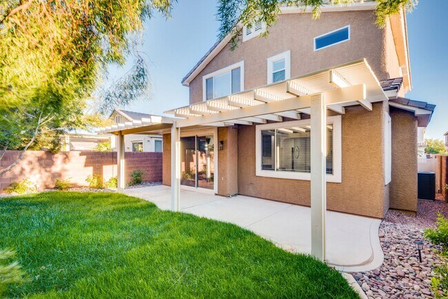 Building Photo - FULLY FURNISHED! Exudes sophistication with designer touches throughout