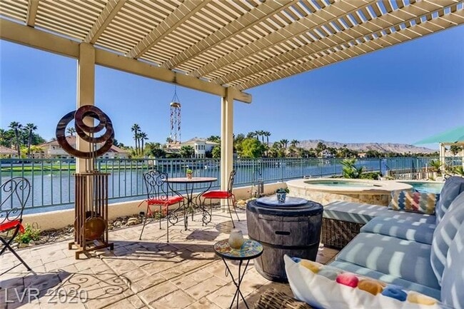 Building Photo - Vegas's Only Available Waterfront Rental ~ 4 Bedroom Desert Shores Lake Front Home