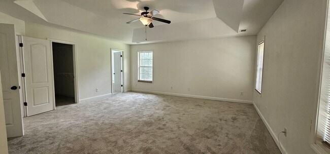 Building Photo - Commanding Curb Appeal, Conveniently Place