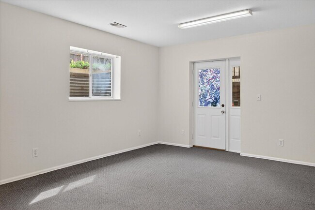 Building Photo - 4BR/4BA Updated Home with Finished Basement Suite & Landscaped Yard