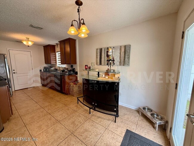 Building Photo - 7541 Allspice Cir N