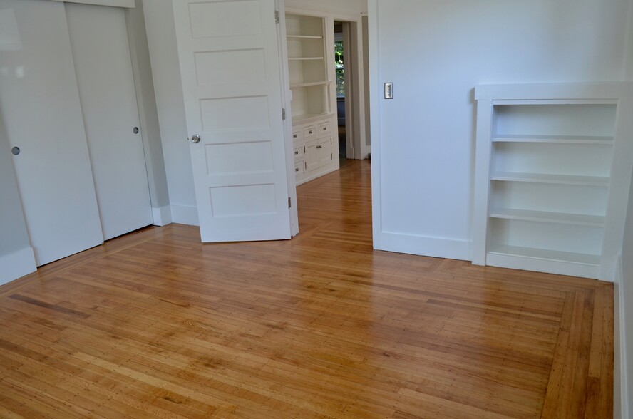 view from primary bedroom into living room - 568 Merrimac St