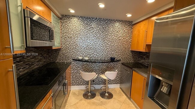 Building Photo - 6365 Collins Ave