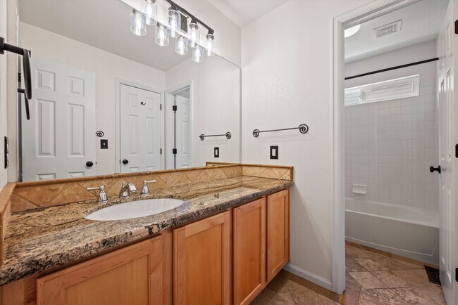 Building Photo - Stunning Tennyson Park Home | 4 Bedrooms, Finished Basement & Open Space Views