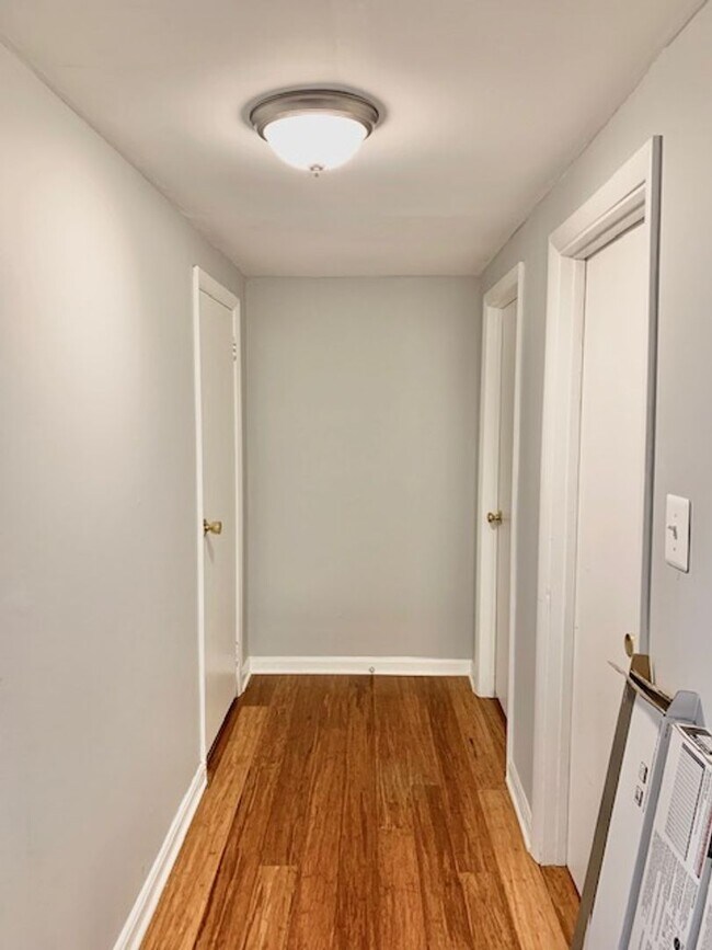Building Photo - Light filled 2 BR plus 2 rooms, 2 FB including one in finished basement. Great location