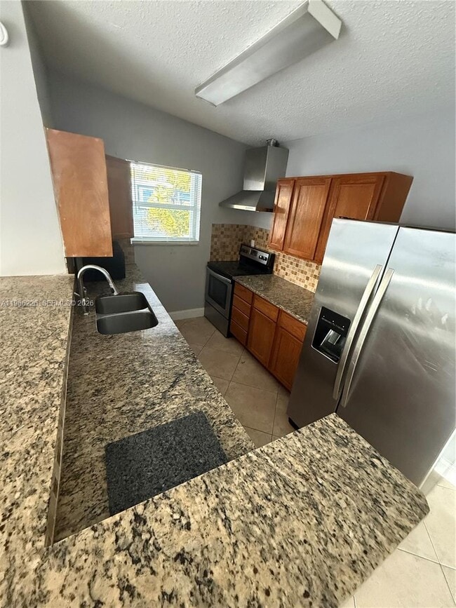 Building Photo - 4120 NE 12th Terrace